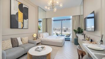 Luxury Studio, Balcony | Individually furnished, iron/ironing board, cribs/infant beds