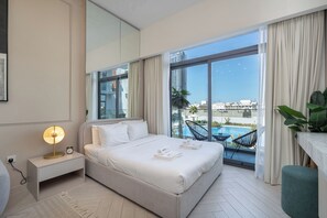 Luxury Studio, Balcony | Individually furnished, iron/ironing board, cribs/infant beds