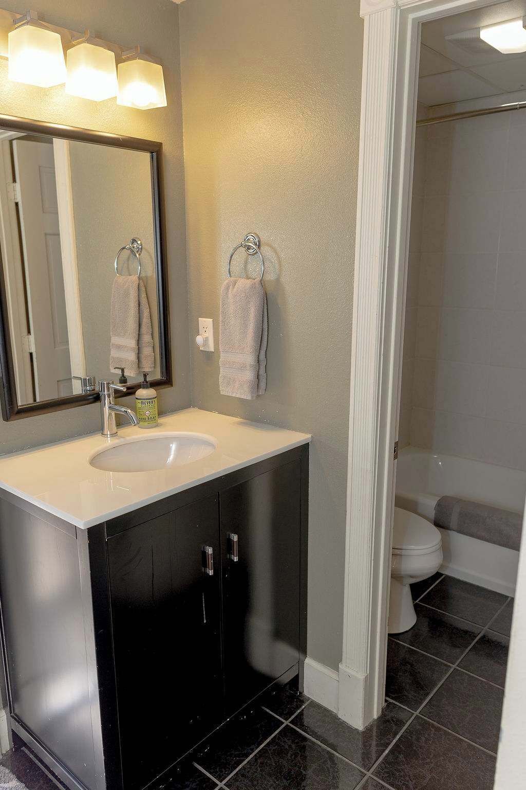 Shower, hair dryer, towels, shampoo