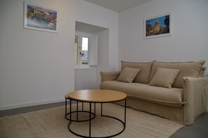 Apartment | Living area - Suite 101 - 2 Bedroom Suite at Amando Perez Suites (Ribadeo)