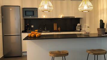 Apartemen | Dapur pribadi | Lemari es, microwave, oven, dan kompor