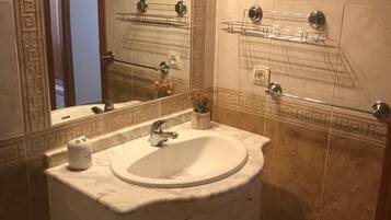 Apartment | Bathroom | Combined shower/tub, deep soaking tub, towels, toilet paper