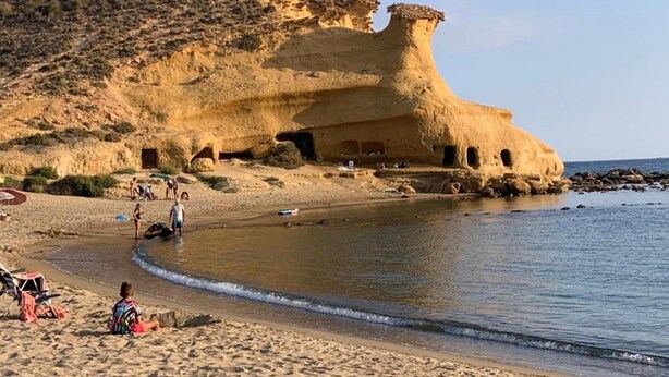 A beach with a large rock formation and a small cave-like structure. - 2 Bed House - Sleeps 4 - Pool - Terrace - Parking (Pulpi)