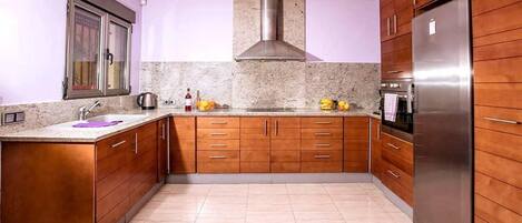 Villa | Private kitchen | Fridge, microwave, oven, stovetop