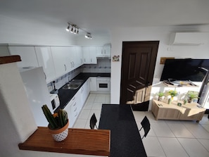 Apartemen | Dapur pribadi | Lemari es, microwave, oven, dan kompor