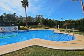 Apartment | Kolam renang | Kolam renang terbuka 