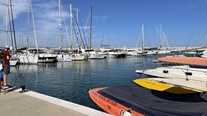 A marina with multiple sailboats docked. - Newly Refurbished Luxury 3 Bed Duplex Apartment (Fuengirola)