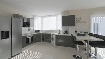 Villa | Private kitchen | Fridge, microwave, oven, stovetop