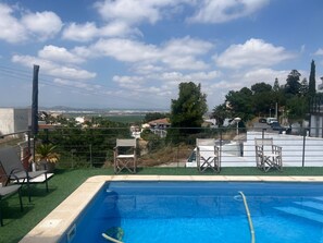 A swimming pool with a view of a residential area and distant landscape. - 3 Bed Chalet-pool-pets-hot Tub-parking-garden (Chiva)