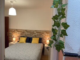 2 habitaciones, tabla de planchar con plancha y wifi gratis 