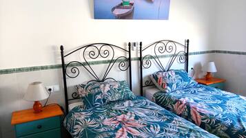 Casa | 3 dormitorios, tabla de planchar con plancha, wifi gratis y ropa de cama