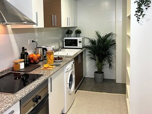 Apartment | Private kitchen | Fridge, microwave, oven, stovetop