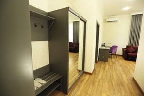 Luxury Suite, Non Smoking, City View | Living area | 43-inch LED TV with satellite channels, heated floors - Parklane Hotel (Tashkent)