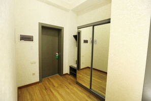Luxury Suite, Non Smoking, City View | Living area | 43-inch LED TV with satellite channels, heated floors - Parklane Hotel (Tashkent)