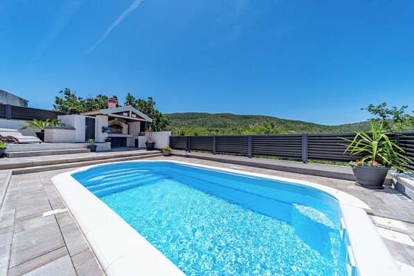 Piscina externa, piscina aquecida