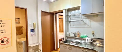 Comfort Apartment | Living area | 32-inch flat-screen TV with digital channels