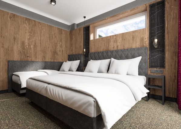 A modern bedroom with a large bed, two bedside tables, and a window with a view. - Astellina hotel-apart (Ischgl)
