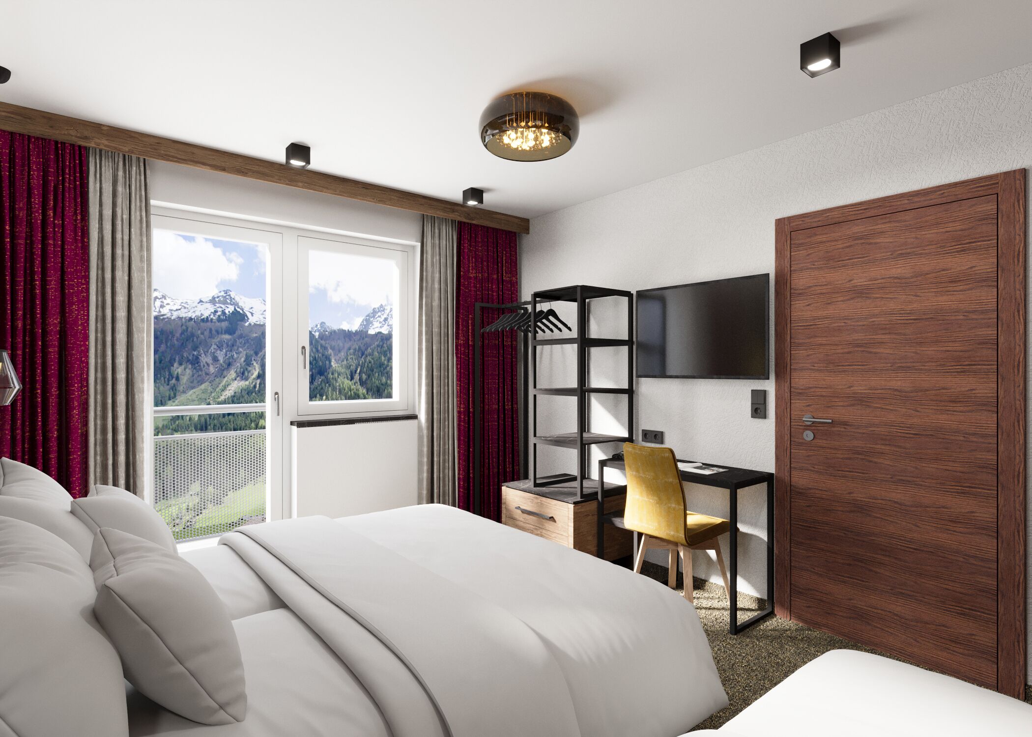 Una habitació d'hotel moderna amb un llit gran, una taula de treball, una cadira i un televisor.