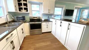 Villa, 2 Bedrooms | Private kitchen | Oven, coffee/tea maker