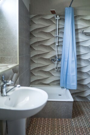 Economy Room | Bathroom | Hair dryer, slippers, towels, soap - Aperol Hotel (Tashkent)