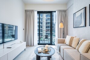 TV - Stunning 1BR Apartment in Azizi Riviera 42, Al Merkadh  by Deluxe Holiday Homes (Dubai)