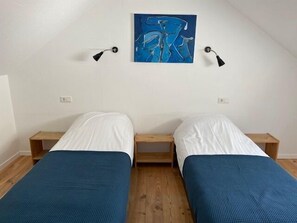 1 slaapkamer, een strijkplank/strijkijzer, wifi