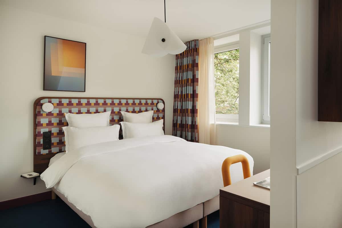2 bedrooms, premium bedding, desk, laptop workspace