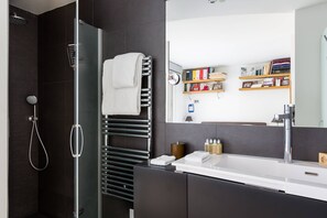 Shower, hair dryer, towels, soap