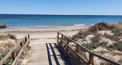 LUXURY HOLIDAY HOME WITH POOL 5 MINS WALK TO BEACH. WIFI,AIR CON, FULL KITCHEN