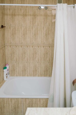 Hair dryer, towels, soap, shampoo