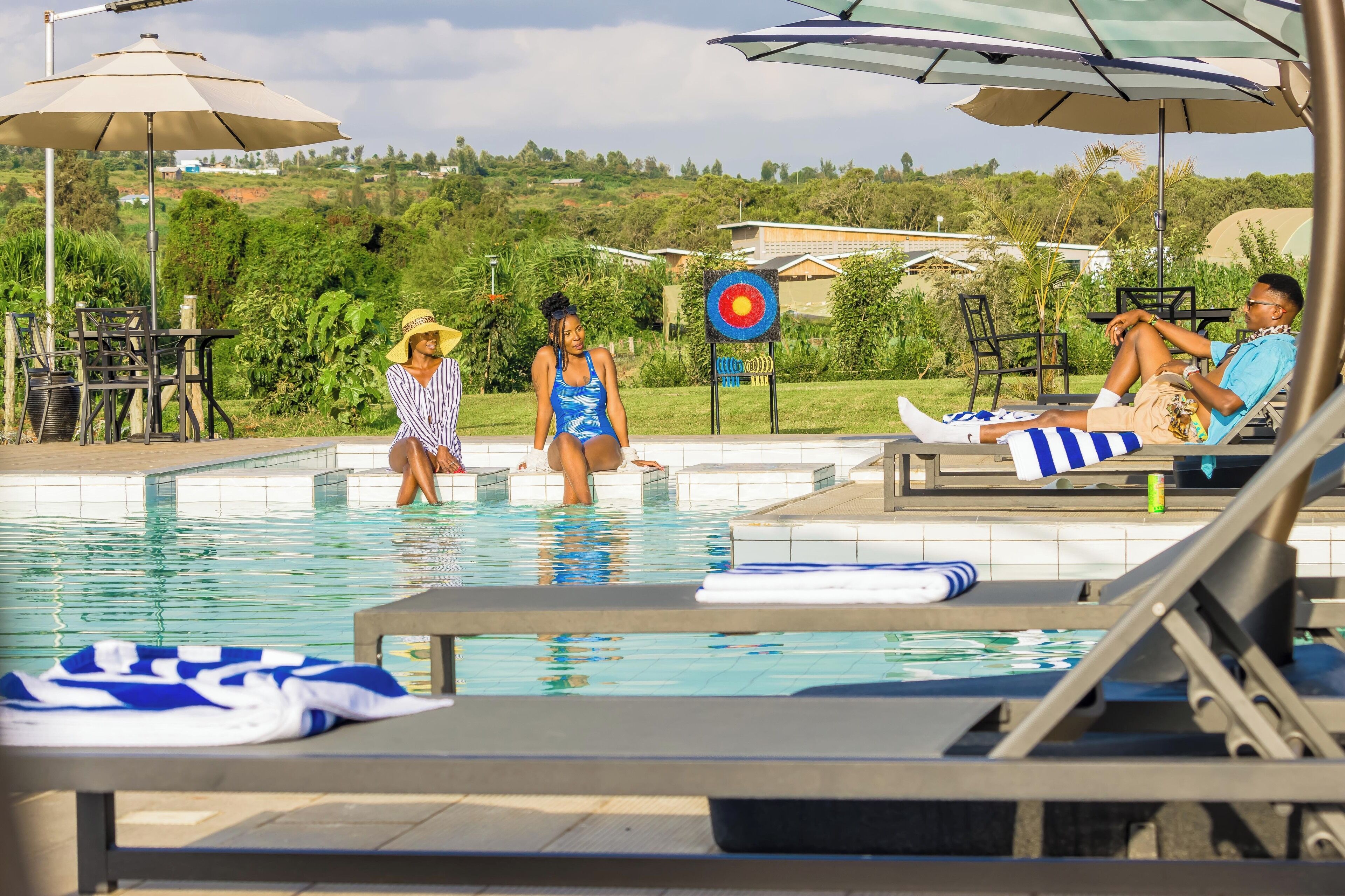 Outdoor pool, open 8:00 AM to 6:00 PM, pool umbrellas, sun loungers
