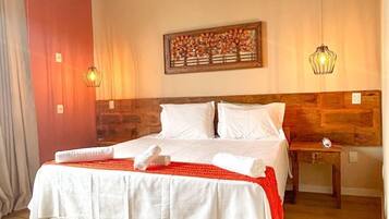 Deluxe Double or Twin Room | Minibar, desk, laptop workspace, blackout curtains