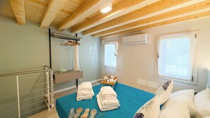 2 dormitorios, tabla de planchar con plancha, wifi gratis y ropa de cama