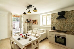 Ferienhaus | Wohnbereich | 35-Zoll-Flachbildfernseher mit Digitalempfang
