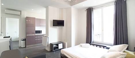 1 chambre, fer et planche Ă repasser, Wi-Fi, draps fournis