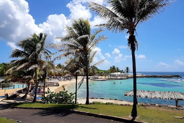 On the beach, sun-loungers