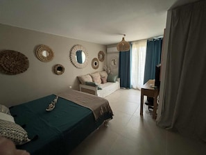 1 bedroom, desk, iron/ironing board, travel cot