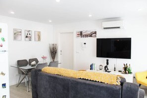 Apartment, City View | Living area | Flat-screen TV - Blossom Cozy Home (Ponta Delgada)