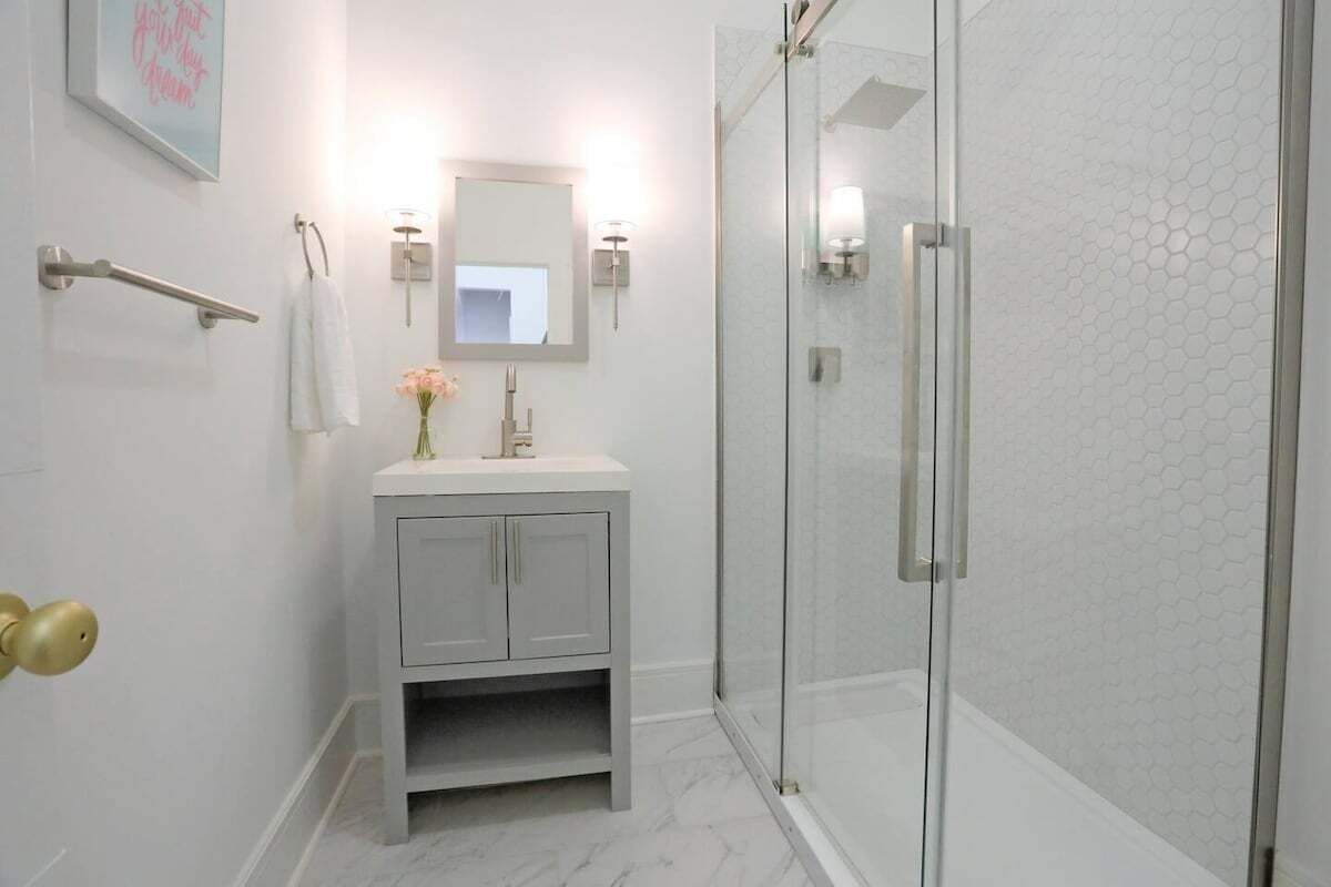 Sunset Sorbet's bathroom features a stylish walk-in shower and playful details, making every refresh a delight