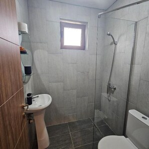 Hair dryer, towels, soap, shampoo