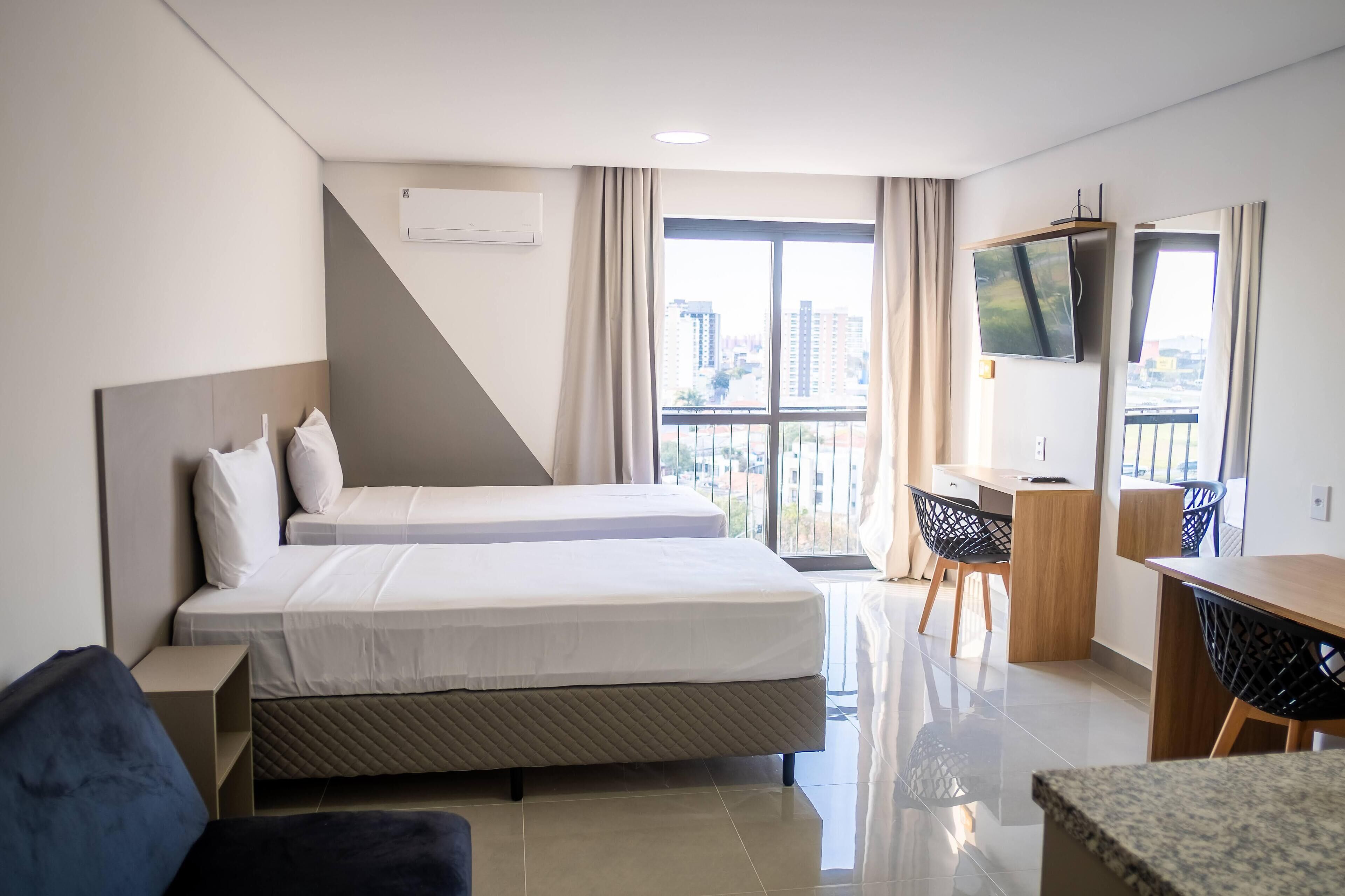 Standard Triple Room, Multiple Beds | In-room safe, desk, laptop workspace, blackout drapes