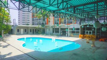 Outdoor pool, open 6:00 AM to 9:00 PM, pool umbrellas, pool loungers