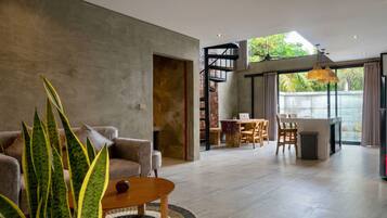 Villa | Living area | 25-inch TV with satellite channels