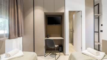 2 chambres, coffres-forts dans les chambres, fer et planche Ă  repasser