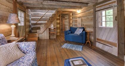 Creekside historic log cabin w/ modern amenities at historic Wade's Mill