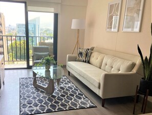 Apartamento básico | Área de estar | Smart TV 55 polegadas com canais digitais