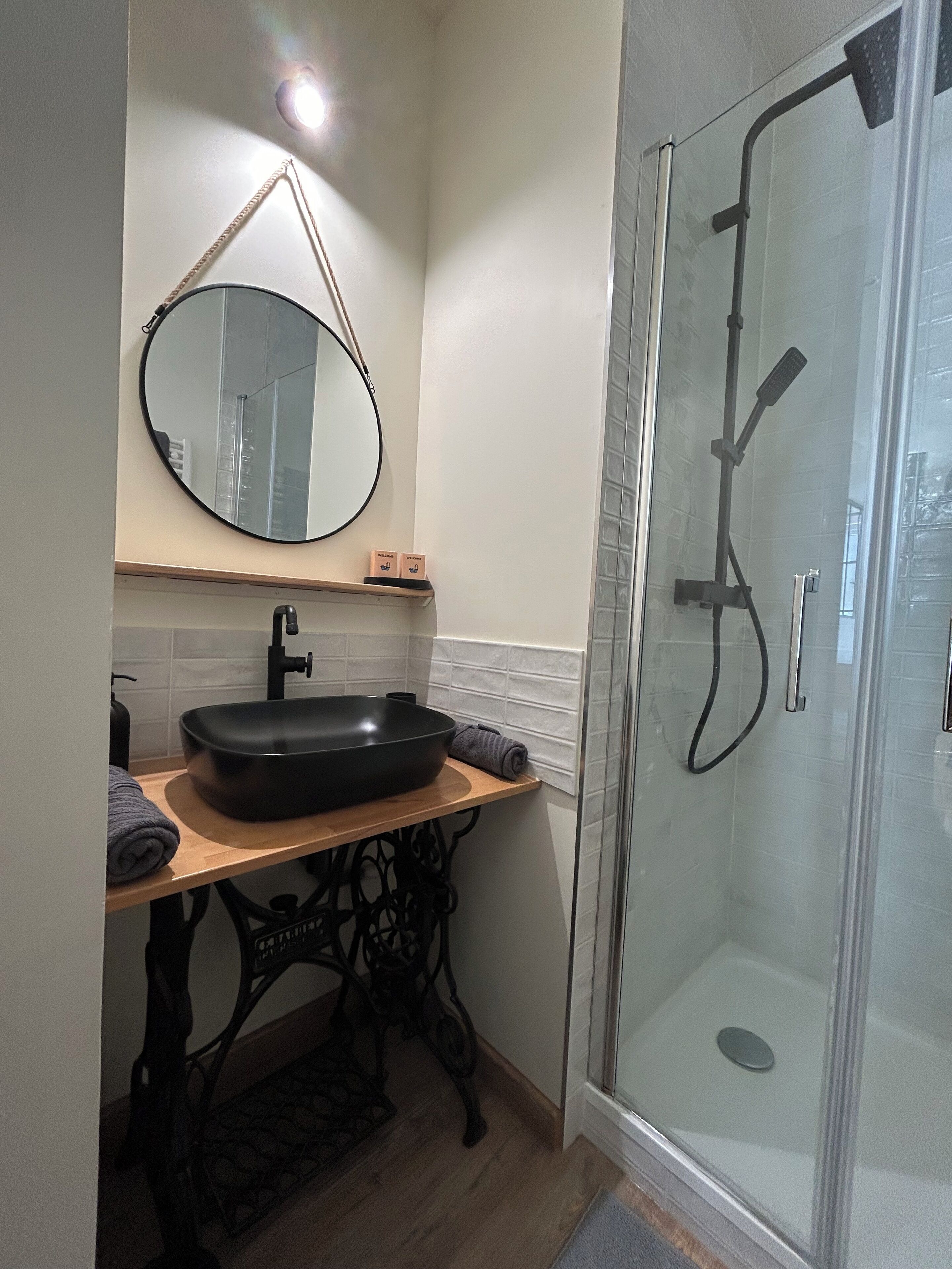 Shower, hair dryer, towels, toilet paper
