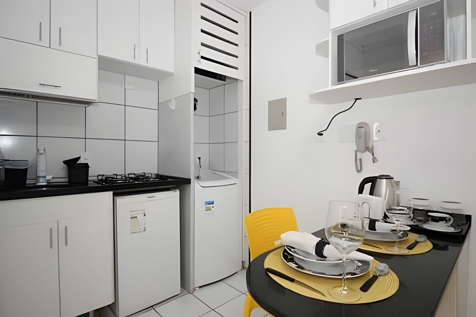 Apartment | Private kitchen | Mini-fridge, microwave, stovetop, cookware/dishes/utensils