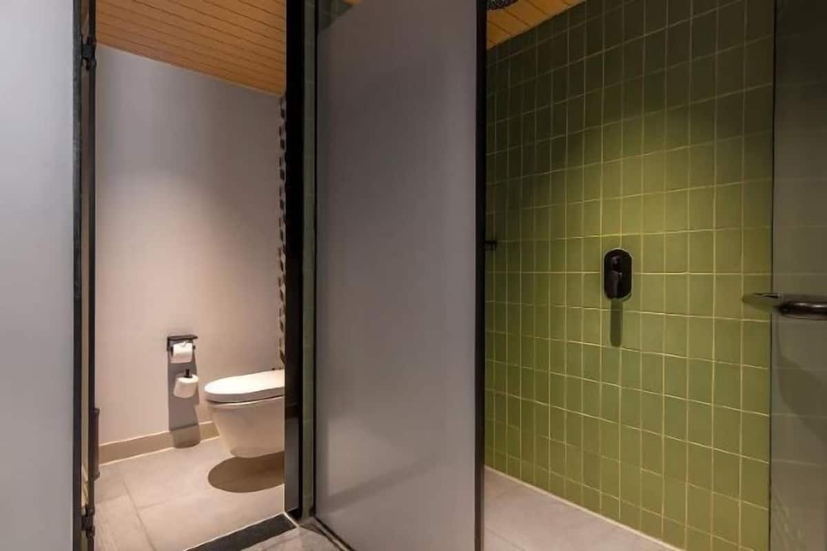 Bathroom | Hair dryer, bathrobes, slippers, soap