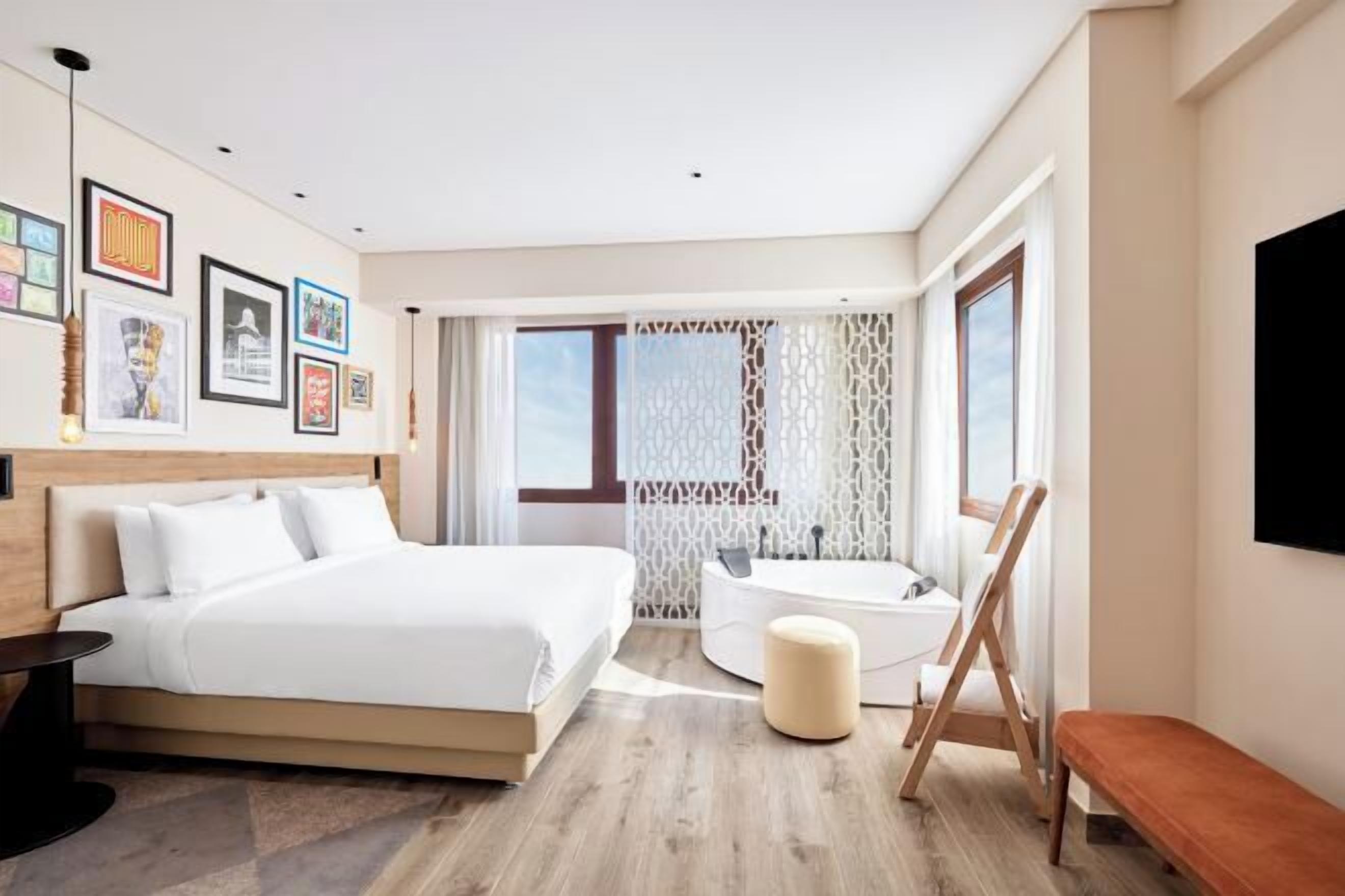 Egyptian cotton sheets, premium bedding, minibar, in-room safe